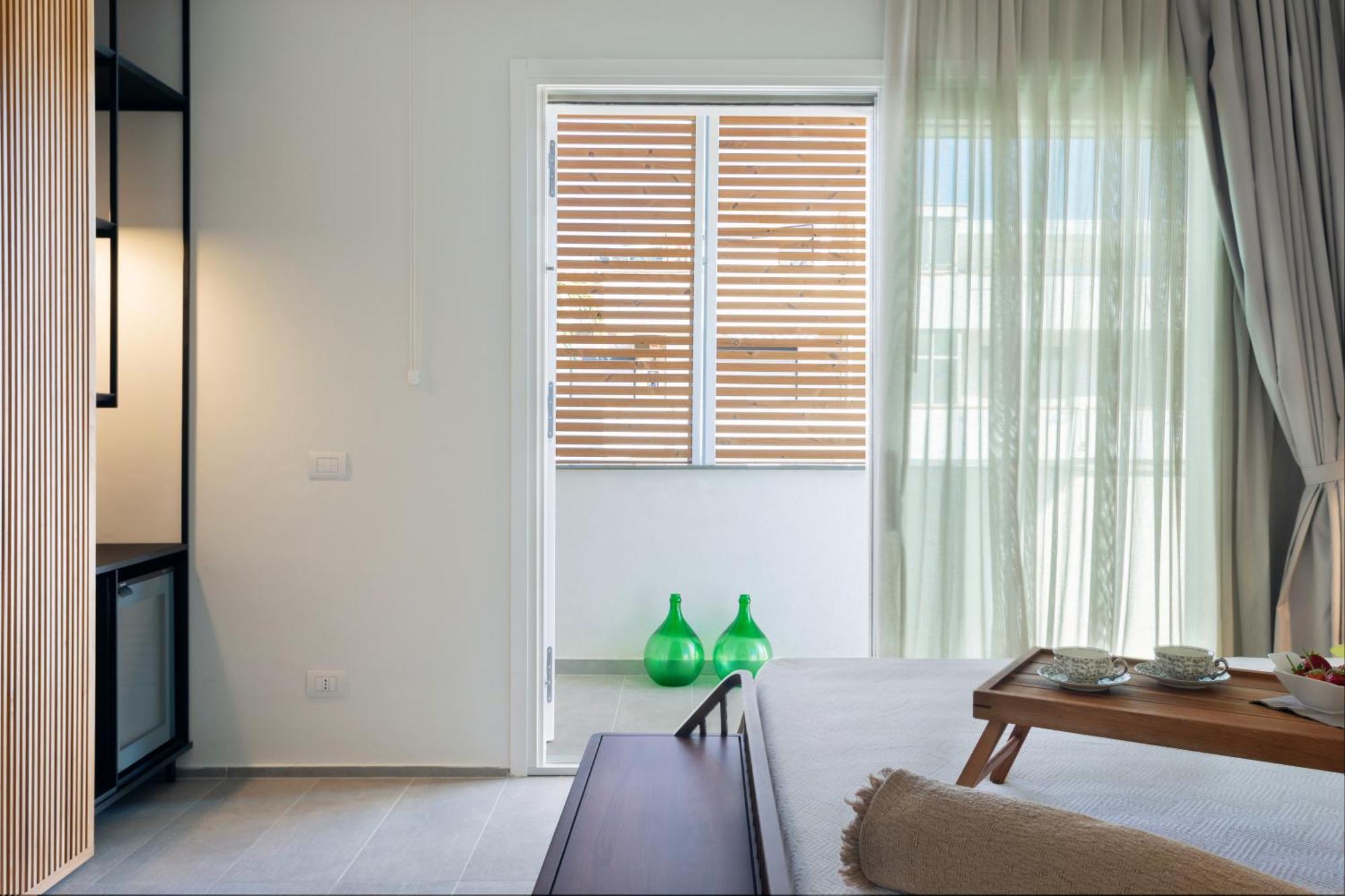 Domia Boutique Hotel E Cucina Монделло Экстерьер фото